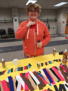 Teen making a bow tie