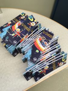 Pile of Summer Reading Club theme bookmarks