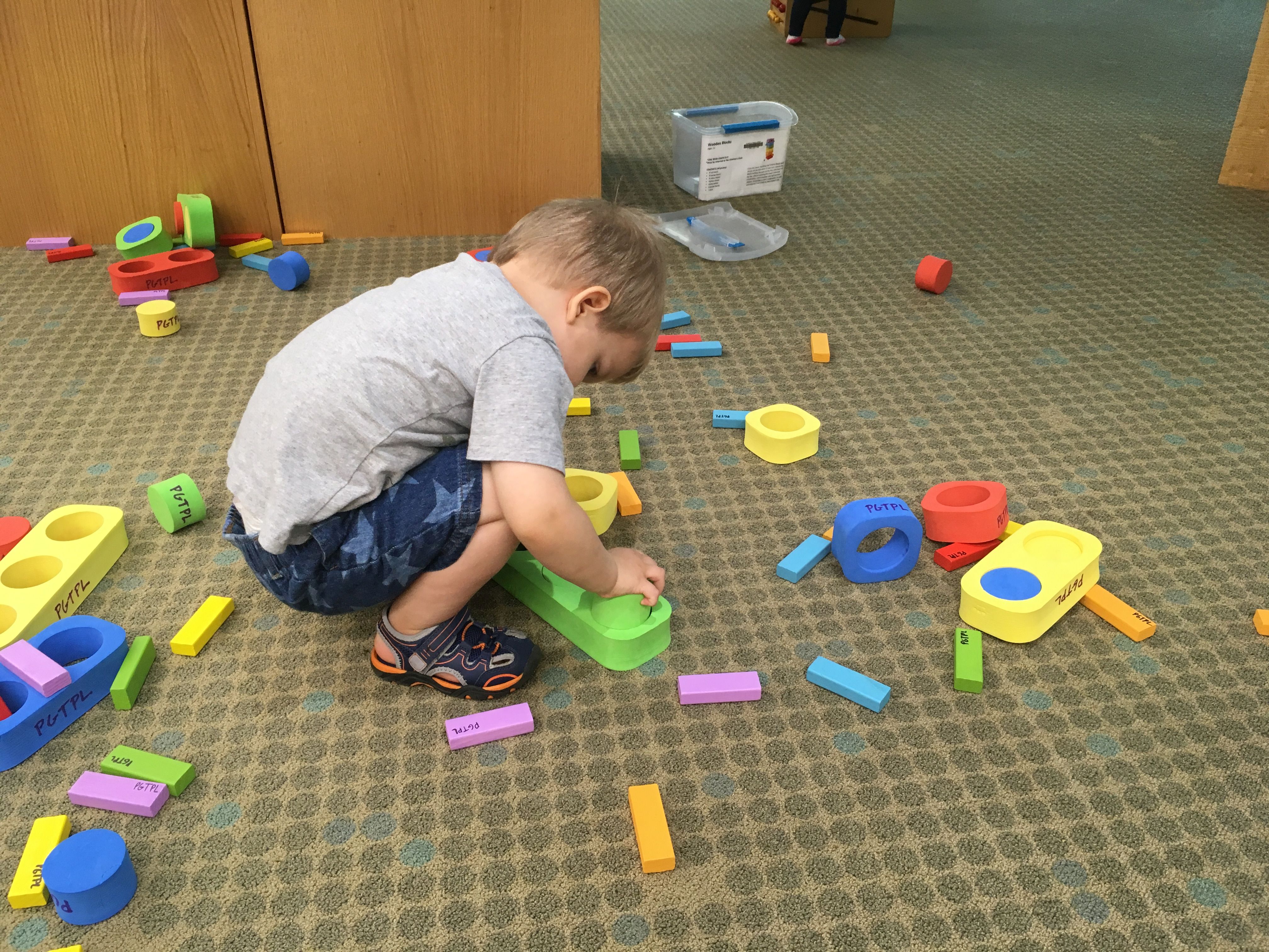 Kid Playing with Kit Blocks