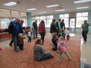 Kids and adults dancing to the Silly Dance Contest