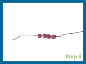 pink beads on wire